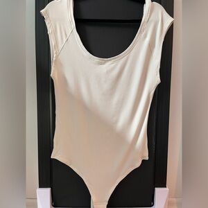 Lululemon Bone Ribbed Bodysuit Size 12 Never Worn